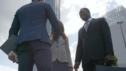 Business People Shaking Hands in an Urban Environment