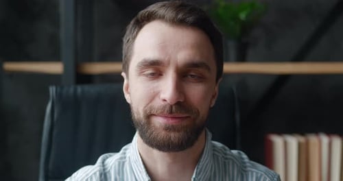 Close Up Face of Smiling Bearded Professional Businessman Looking at Camera