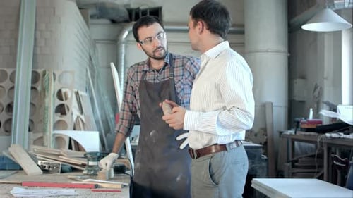 The Boss Pays the Carpenter in Workshop