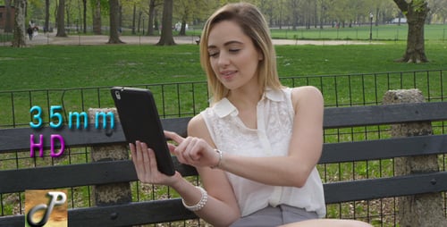 Woman on Tablet in Central Park New York