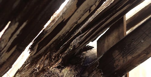 Rustic Wooden Beams in Abandoned Building