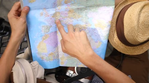 Traveler Planning a Trip in Urban Setting