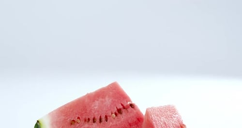 Watermelon pieces on white background