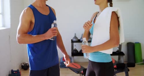 Man and Woman Talking After Working Out
