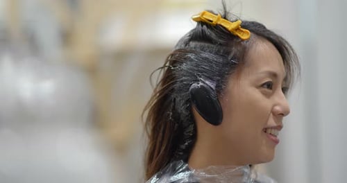 Woman Getting Hair Dyed at Salon, Mid Shot