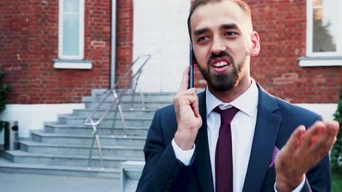 Man in Business Suit Talking on the Phone, Outdoor in the City
