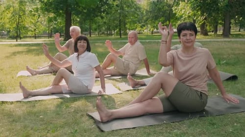 People Practicing Yoga Outdoors