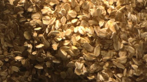 Oats Are Tossed In The Air In Slow Motion