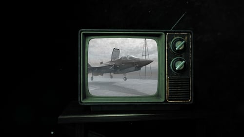 Retro Television Set Displaying Military Operations Footage