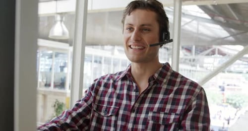 Young man working in a creative office