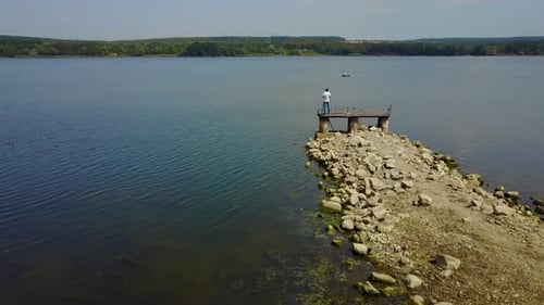Male Photographer Near The Lake