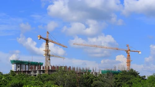 Construction Cranes Building in the City on Hill