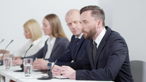 Panel of Professionals in a Corporate Meeting
