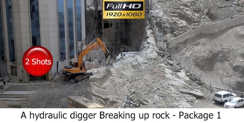 A Hydraulic Digger Breaking Up Rock - Package 1