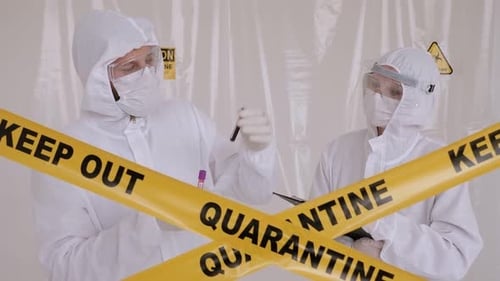 Researchers Analyzing Vials in Quarantine Area