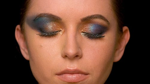 Woman's Face with Elaborate Makeup Close Up