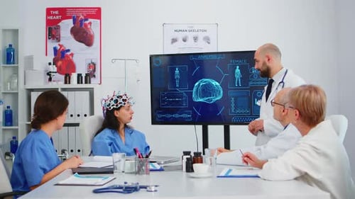 Medical Team Discussing Brain Scan Results in Hospital