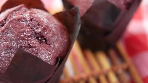 Close Up of Muffins on Table Isolated on Black