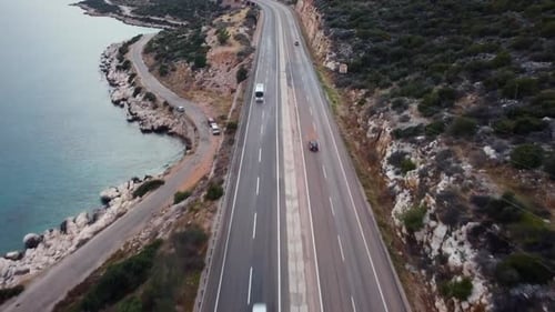 Cars Drive Highway Along Sea Coast Evening