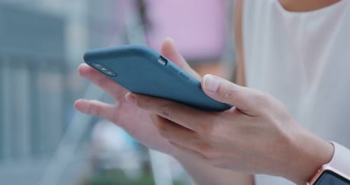 Close up Of Woman Finger Touch on Cellphone