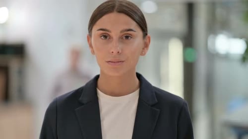 Young Adult Woman in Business Blazer Portrait
