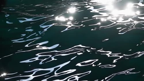 Sunny Rays Playing in the Sea Waves. Slow Motion. Close Up