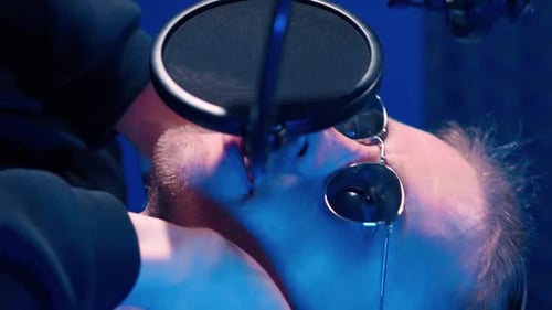 Male Rap Singer Sings Hip Hop in Microphone