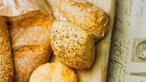 Variety of Bread on Wooden Cutting Board
