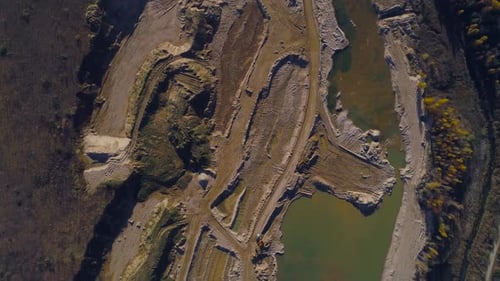 Aerial View of Sand Quarry Next to Lake