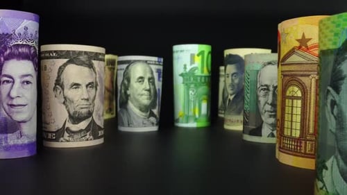 Foreign currency money exchange concept. Many banknotes of different nations.