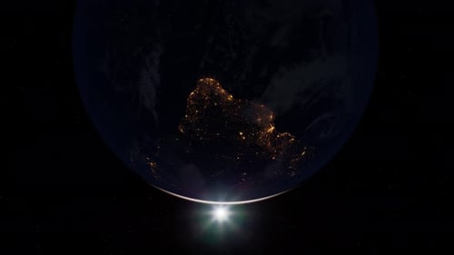 Earth Globe from Space with Sunrise and City Lights