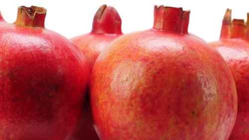 Group of Delicious Pomegranates Close Up