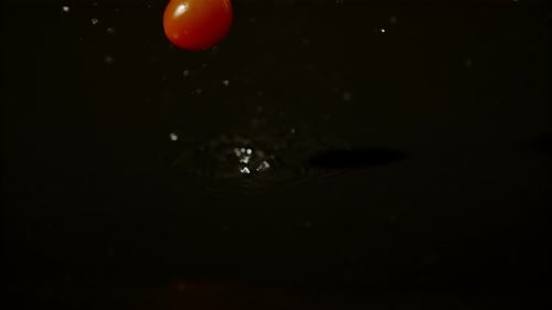 Cherry tomatoes falling and bouncing, Ultra Slow Motion