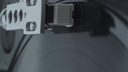 Record Player Needle Touching Vinyl Record
