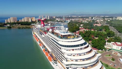 Large Cruise Ship at Tropical Destination on Sunny Day