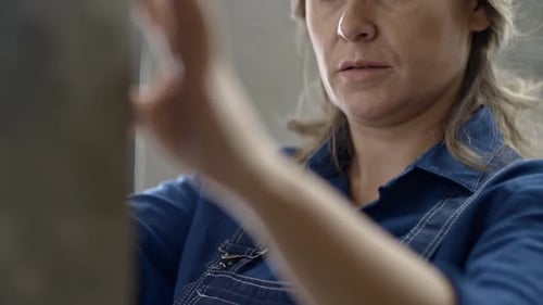 Female Engineer Working on Construction Site