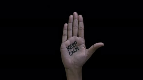 Hand Opens to Reveal Keep Calm Message