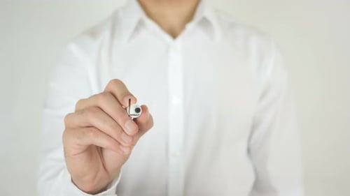 Man Writes the Word Leasing on Glass