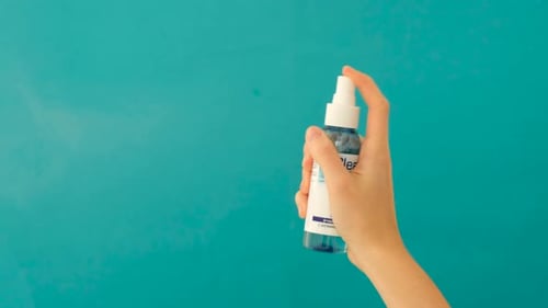 Hand spraying a disinfection product