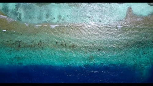 Aerial drone landscape of tropical sea view beach adventure by aqua blue sea with white sandy backgr