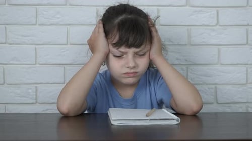Child Tired From Learning.