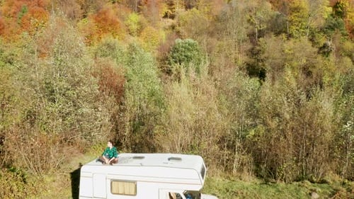 Scenic Forest Aerial with RV and Autumn Foliage