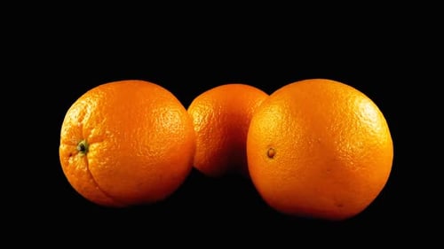 Oranges on a Black Background