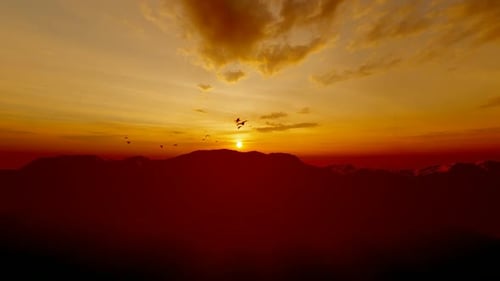Sunset Mountain and Birds Dancing in the Sky
