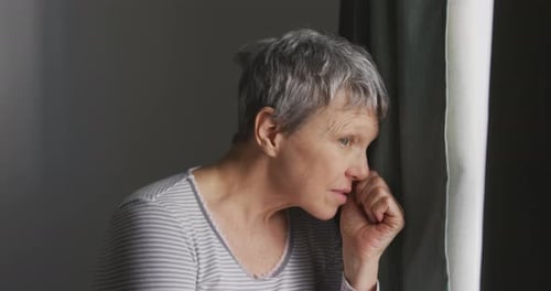 Senior woman at home alone