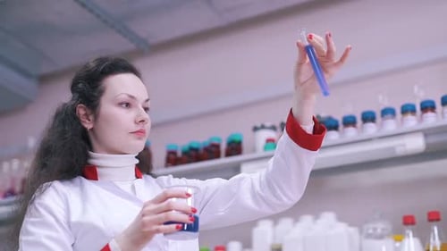 a Scientist Estimates Liquid in a Test Tube