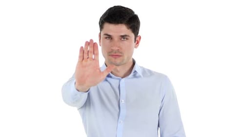 Stop Opposing Hand Gesture By Businessman White Background