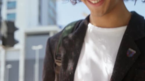 Man using mobile phone on city street 4k