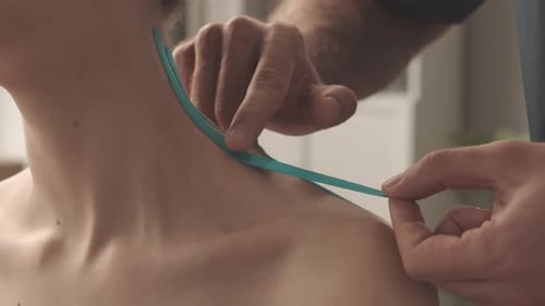 Medical Tape Applied to Neck and Shoulder