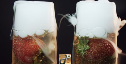 Sparkling Drink with Strawberry in Cocktail Glass